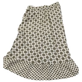 Falda a media pierna de jacquard con volantes asimétricos en seda color marfil de Michael Kors