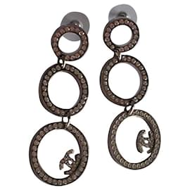 Orecchini pendenti Chanel con cristalli Swarovski argentati