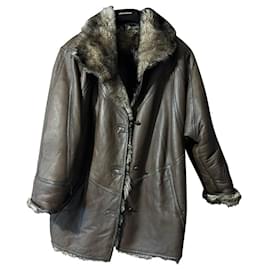 Autre Marque Abrigo largo de cuero y shearling marrón