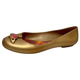 Vivienne Westwood Anglomania Ballerinas in Gold mit dem ikonischen Orb
