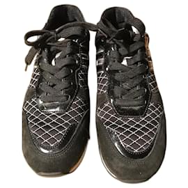 Sneakers Hogan nere con motivi argento