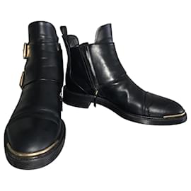 Botas Louis Vuitton de cuero negro con hebillas doradas Talla 38