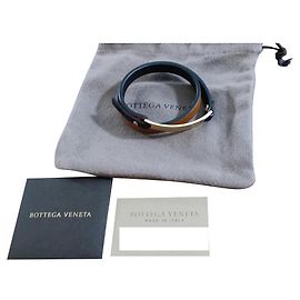 Bracciale Bottega Veneta in pelle e catena barbazzale in oro