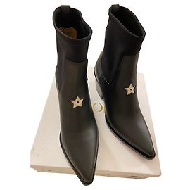 Stivali texani Christian Dior in pelle nera con stella bianca