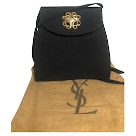 Sac à main Yves Saint Laurent en toile noire et détails dorés