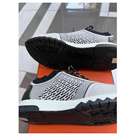 Hermès Sneakers Addict schwarz/weiß