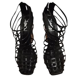 Bottines Cage Yves Saint Laurent en cuir noir 38