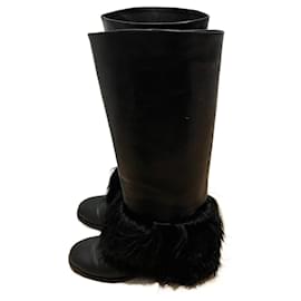Chanel Stiefel aus schwarzem Leder und Pelz