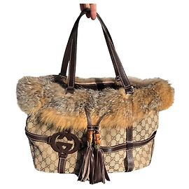 Borsa Gucci Reins marrone in pelle e ecopelliccia