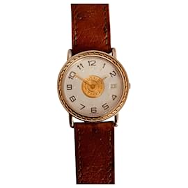 Montre Hermès Sellier Or et Acier Blanche