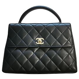 Borsa piccola vintage Chanel in pelle di agnello GHW