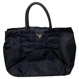 Borsa a fiocco Prada in nylon nero con manici in pelle