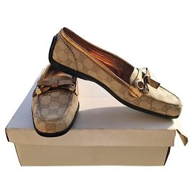 Autre Marque Mocassini Jordan in tela beige con fiocco dorato