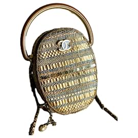 Borsa Chanel Camera Case in paglia color oro