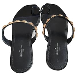 Mules Louis Vuitton in pelle nera 37