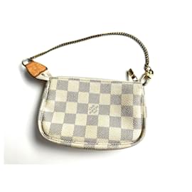 Louis Vuitton Mini accessori per pochette