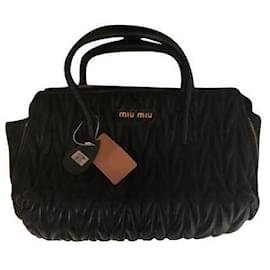 Borsa a mano Miu Miu in pelle beige