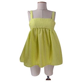 Autre Marque Top matelassé Josie Cecilie Bahnsen amarillo con corte en la espalda