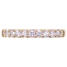 Autre Marque Bündnisring mit Halbdrehung, besetzt mit 11 GELBGOLD DIAMANTEN 750%O