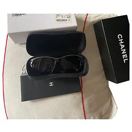 Autre Marque Gafas de sol Chanel negras con lentes de cristal y patillas de metal