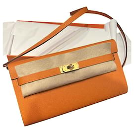 Pochette Hermès Birkin To Go Orange en Cuir