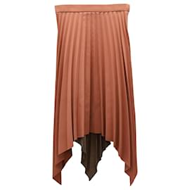 Falda midi asimétrica con pliegues eléctricos en mezcla de lana naranja de Acne Studios