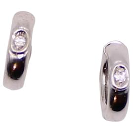 Autre Marque Piccoli orecchini a cerchio in oro bianco 750%o e diamanti