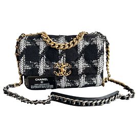 Chanel Chanel media trapuntata in tweed bianco e nero 19 falda
