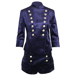 Conjunto de chaqueta militar y pantalones cortos en terciopelo azul de Pierre Balmain