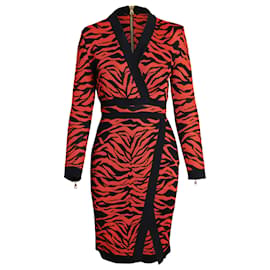Vestido de punto estampado con efecto cruzado en viscosa naranja de Balmain