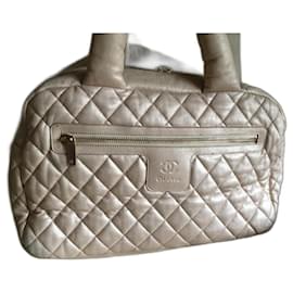 BORSA CHANEL COCO COCOON IN PELLE CHAMPAGNE ORO CHIARO - Chanel