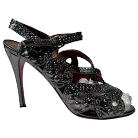 Alaïa Sandali argento con borchie