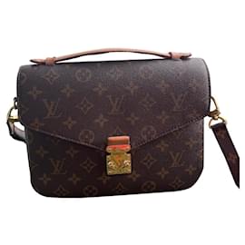 Borsa a mano Louis Vuitton Métis in pelle marrone