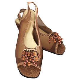 Autre Marque Azurée Sandalen mit Absatz Braun Gold Leder und Nylon