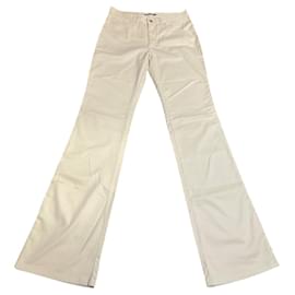 Pantalones acampanados Versace crema algodón