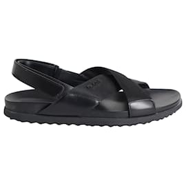 Sandali incrociati con cinturino con logo Prada in pelle nera