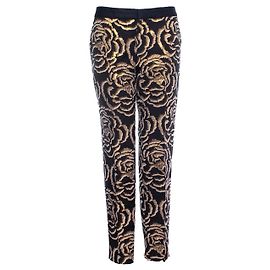 Autre Marque Chloé Stora, pantalon à fleurs dorées
