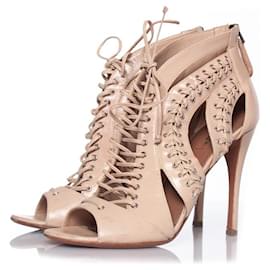 Alaïa Alaia, Sandali ritagliati in pelle con lacci