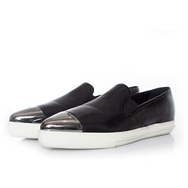 miu miu, sneakers slip on in pelle nera