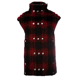 Alexander Wang, chaleco con botones forrados.