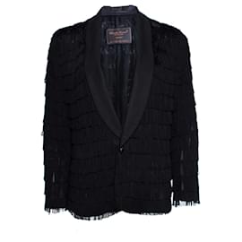 Undercover Clandestino, chaqueta semitransparente con flecos.