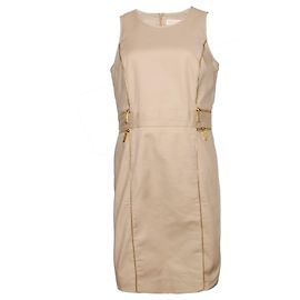 Michael Kors, Vestido beige con cremalleras doradas.