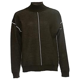 Sandro, jersey de cuello alto verde con ribete blanco