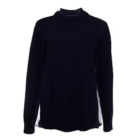 sacai, Top de lana azul con espalda transparente