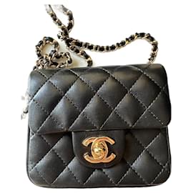 Chanel Mini Bandouliere Handtasche aus schwarzem Leder