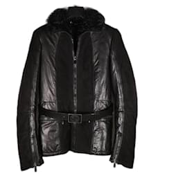 Increíble abrigo de piel de Gucci con cinturón.
