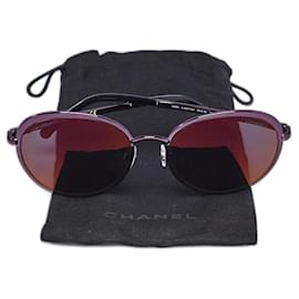 Gafas de sol Chanel moradas con lentes de espejo iridiscentes