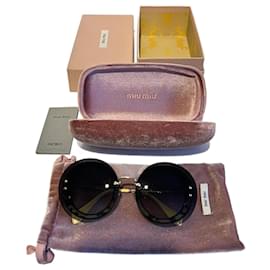 Lunettes rondes Miu Miu