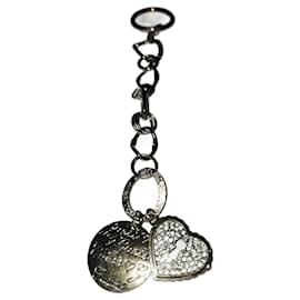 Ciondolo per borsa Guess Cuore e Placca Monogramma Oro