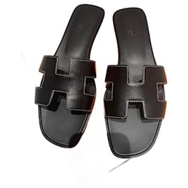 Hermès Oran Sandalen Leder schwarz